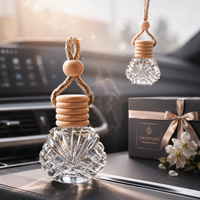 Diffuseur de parfum pour voiture en verre facetté en forme de coquillage, réutilisable, 14 ml, avec bouchon en bois naturel et corde.