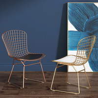 Chaise de salle à manger moderne et extensible en métal ajouré, style nordique, avec structure en fer et bois massif, mobilier de maison créatif, modèle tendance