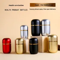 Bouteilles de capsules acryliques de qualité alimentaire haut de gamme bouteilles de distribution en plastique avec bouchon à vis joint produits de santé emballage de pilule vide