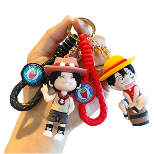 Venta al por mayor 3D un personaje PVC llaveros Japón Anime <span class=keywords><strong>Luffy</strong></span> tejido <span class=keywords><strong>de</strong></span> goma <span class=keywords><strong>de</strong></span> dibujos animados colgante muñeca luz llavero regalo - Product Image 1