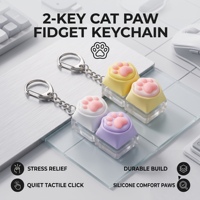 Porte-clés anti-stress à double patte de chat avec interrupteur mécanique pour clavier, jouet mignon, cadeau de Noël, de bureau ou de fête