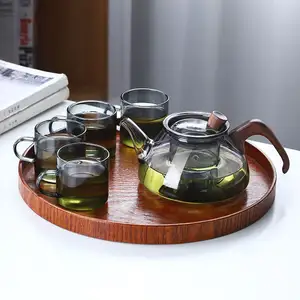 Teko kaca borosilikat tinggi bahan kaca, teko teh kantor tahan panas dengan saringan Pot bunga