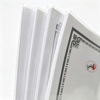 Cahier d'exercices arabe personnalisé 215x154mm avec reliure piquée à cheval et couverture transparente, pages quadrillées, impression OEM en gros