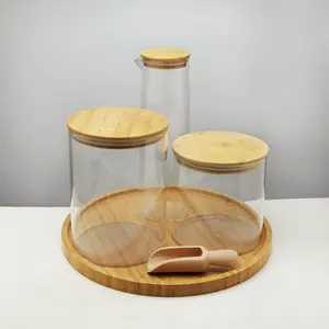 Les récipients en verre avec bambou pour le rangement du linge à domicile, design tendance, collection 2022