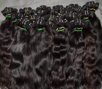 Proveedor de doble dibujado Remy sin procesar Virgen cruda a granel cabello humano 10A 12A 15A grado indio crudo indio paquetes de cabello estilo ondulado