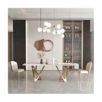 Ensemble de table rectangulaire en marbre avec base dorée en acier inoxydable et forme C, design italien, table et chaises de salle à manger de luxe