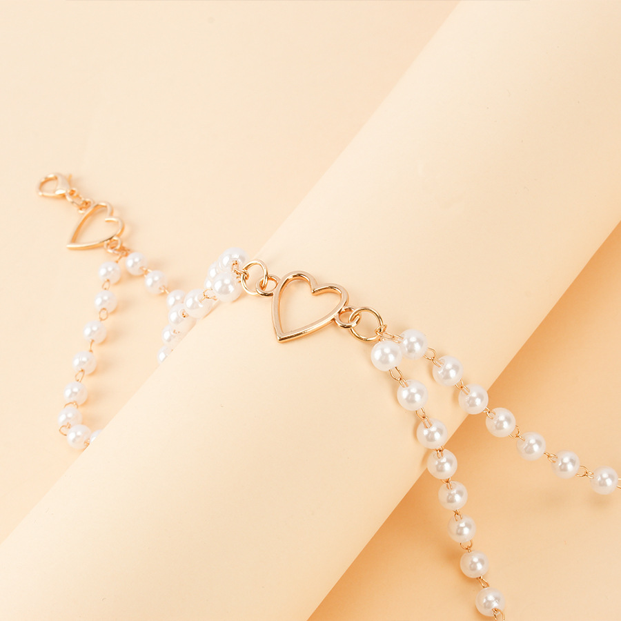 โซ่คาดเอวสีทองประดับมุกสี่เม็ด