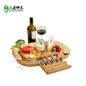 Ensemble plateau à fromage en bambou avec couteau ; plateau à fromage rond en bois d'acacia ; plateau à fromage carré avec tiroir et ensemble de couteaux. - Product Image 1