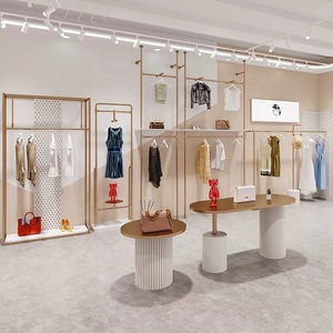 Progettazione su ordinazione del negozio della decorazione del negozio dello scaffale di vestiti del banco di mostra dell'abbigliamento della parete dell'oro per il negozio - Product Image 2