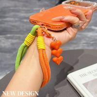 Cordon de téléphone tressé color block court anti-perte avec pendentif cœur, breloque de téléphone personnalisée très tendance