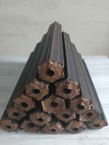 Las briquetas Premium Pini Kay, hechas de aserrín natural, ofrecen un calor potente y constante para asar y calefacción industrial. - Product Image 6