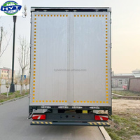 Promotion : Semi-remorque porte-conteneurs 4 essieux 40 pieds avec compartiment de chargement fermé pour un transport efficace