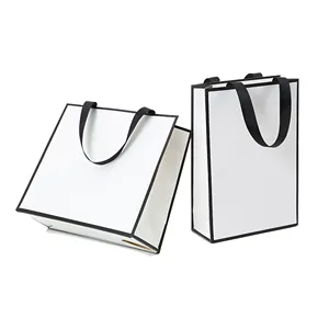 Factory Direct Supply Customized Logo Luxury Paper Gift Bag Clothes Packaging Paper Shopping Bag With Handle