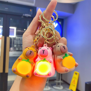 Wholesale Cute Capybara <b>Doll</b> Keychain Cartoon Style Animal Pattern Rubber Car Pendant Safe Bag <b>Accessories</b> for Camping Lighting - Product Image 1