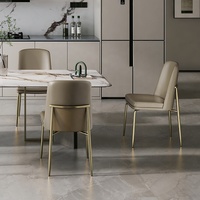 [En stock] Chaise de salle à manger italienne en cuir de vachette de première qualité, chaise haut de gamme sans accoudoirs avec structure en métal de luxe léger pour la maison