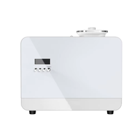 Diffuseur d'arômes d'huiles essentielles sans eau pour grandes surfaces, idéal pour les hôtels, spas, boutiques et halls commerciaux.