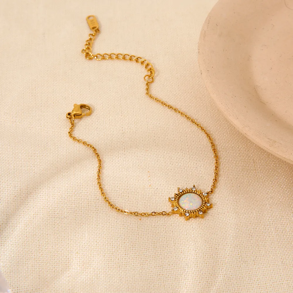 INS Modisches 18K Gold plattiert Edelstahl rund Opal Sonnenanzünder-Armband für Damen wasserdichter Schmuck