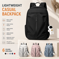 Sac à dos pour ordinateur portable léger OEM personnalisé de 14 pouces avec fermeture éclair frontale verticale, poche antivol et pendentif astronaute pour usage quotidien
