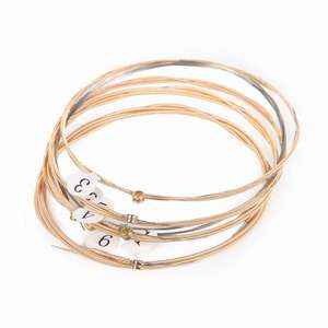 Corde per <span class=keywords><strong>Chitarra</strong></span> Acustica Tucana Nickel Wound, Finitura Opaca Dorata, Confezione in Scatola di Carta, MOQ 500, 10 Pezzi, Calibro 010 011 <span class=keywords><strong>LA</strong></span>/LC/LE/LB - Product Image 5