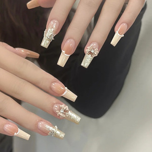 TikTok, superventas, Uñas postizas portátiles de gama alta, puntas francesas hechas a mano, pegatinas de uñas con purpurina de mariposa y diamantes de imitación - Product Image 1