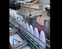 Machines de remplissage automatiques à 4 buses pour liquides pétillants : lait, produits chimiques, eau, boissons, éthanol, alcool, jus, eau de Javel, détergent