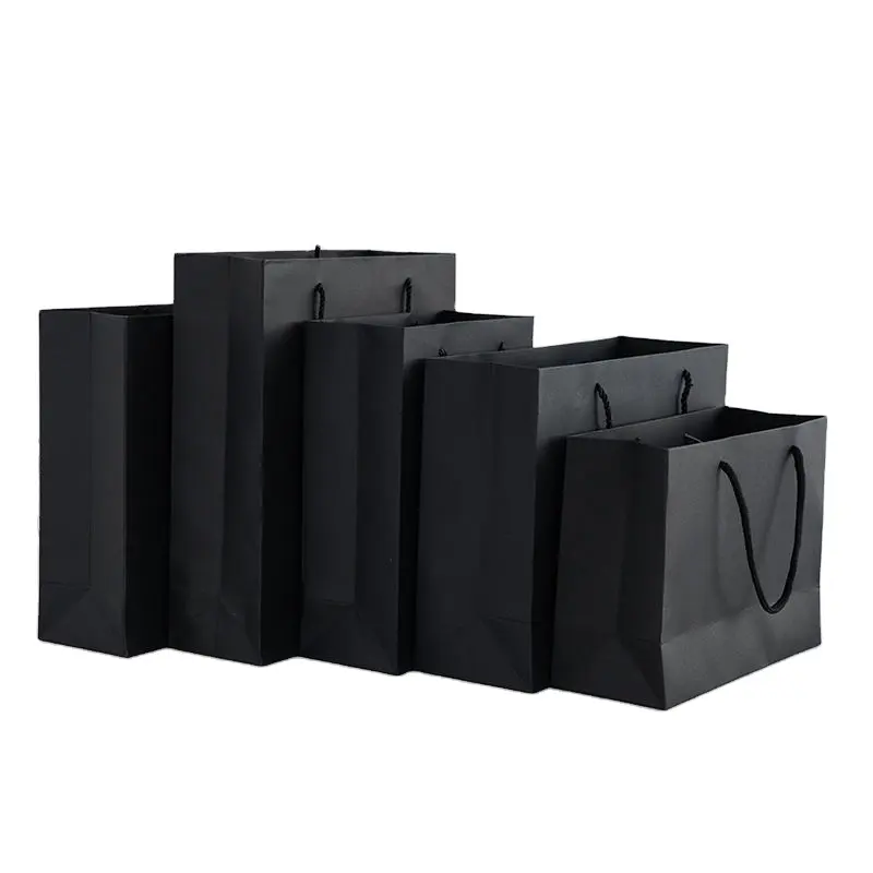 ダイカットハンドル付きギフト/衣類包装紙ショッピングバッグ用の最高品質のカスタムロゴ印刷紙袋