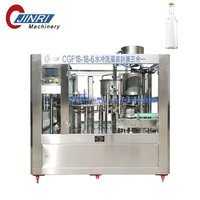 Ligne complète de production d'embouteillage d'alcool, de spiritueux, de liqueur et de boisson Machine de remplissage et de capsulage de bouteilles en verre de vodka, de whisky et de vin