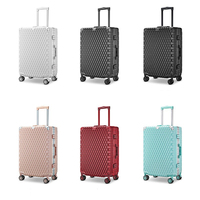Valise rigide moderne personnalisable en gros, bagage de voyage unisexe avec doublure en polyester et cadre en aluminium incassable