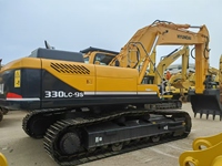 Korea Selatan Menggunakan Excavator Mini Crawler Hyundai 330LC-9S dengan Berat Operasi 33 Ton