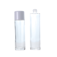 Vente en gros de bouteilles de parfum vides en verre transparent, emballage de boîte ronde personnalisée de 100ml, bouteilles en verre de pompe de pulvérisation de lotion