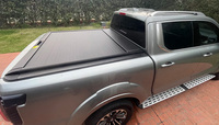 Couverture de benne rigide enroulable et rétractable en aluminium OEM/ODM RDX UTE pour pick-up Isuzu Dmax L200 (5, 5.5, 6, 6.5, 8 pieds)