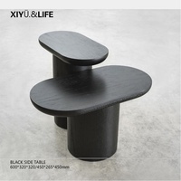 Nouvelle table d'appoint ovale noire style nordique Wabi-Sabi, texture bois, design moderne et minimaliste, pour coin de canapé