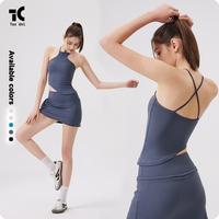 Ensemble de sport sexy à dos ouvert avec coussinets de poitrine fixes, débardeur de fitness, short taille haute deux pièces uni et jupe de badminton, tennis, yoga
