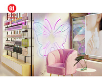 Aménagement intérieur de boutique de cosmétiques haut de gamme, vitrine de soins de la peau et de parfums, rénovation de salle d'exposition de centre commercial pour l'aménagement de magasins