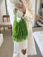 Sac à main tissé à la main unique à la mode loisirs plage seau bord de mer sac creux Crochet Tricot avec pompon