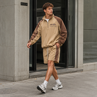 Ensemble de survêtement IKDEER personnalisé à blocs de couleurs, haut à demi-zip et short à cordon de serrage pour les loisirs en plein air et les activités quotidiennes