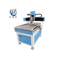 Machine de gravure CNC UBO 6090 1212 Mini avec Nc Studio Mach 3 DSP pour la gravure sur acrylique, bois, PVC, aggloméré