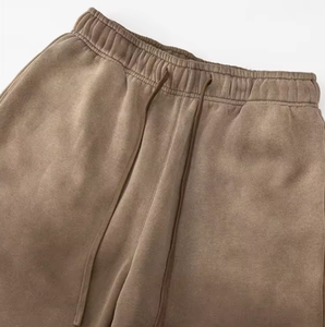 กางเกงขายาวผู้ชายสไตล์อเมริกัน ลายสเปรย์ย้อม ขาดๆ แบบวินเทจ มีเชือกผูก เอวสม็อค ซักได้ สวมใส่สบายทรงหลวม - Product Image 2