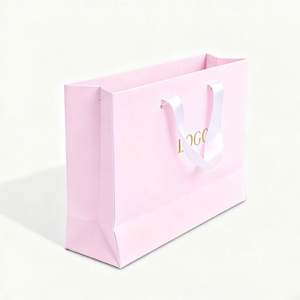 Sac de shopping en papier couché OEM avec design gratuit, sac de vente au détail brillant pour les grands magasins et les boutiques - Product Image 1