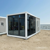 Vie moderne Maisons portables Villa préfabriquée intelligente en acier Chambre à coucher Mur rideau en verre Maison conteneur pour le logement