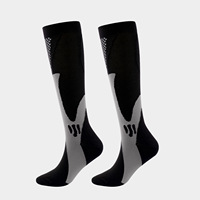 Vente en gros de chaussettes de football personnalisées Chaussettes de football d'élite Chaussettes de sport pour hommes avec logo personnalisé Jacquard à la mode