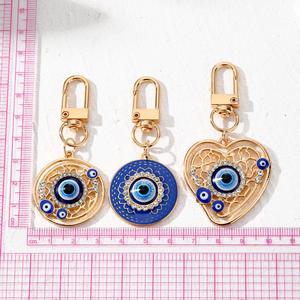 Porte-clés tendance œil de démon, main de Fatima, pendentif paume, bijou populaire pour femmes, pour clés de voiture et sacs d'école - Product Image 5