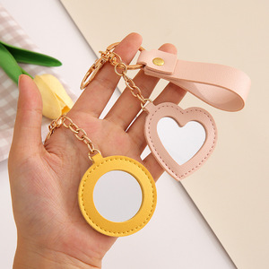 Porte-clés miroir en alliage en forme de cœur, créatif et simple, avec motif floral en cuir PU, accessoire anti-perte pour sac - Product Image 1