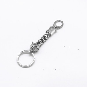 Yunnique – porte-clés en acier inoxydable avec tête de loup, pendentif, cadeau unisexe, bijoux, accessoire de charme en forme d'animal - Product Image 1