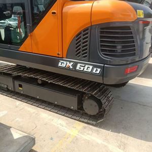 Mini-pelleuse compacte Develon DX60D 6 tonnes, rotation zéro, moteur Yanmar Stage V, prête à l'emploi pour la construction urbaine - Product Image 6