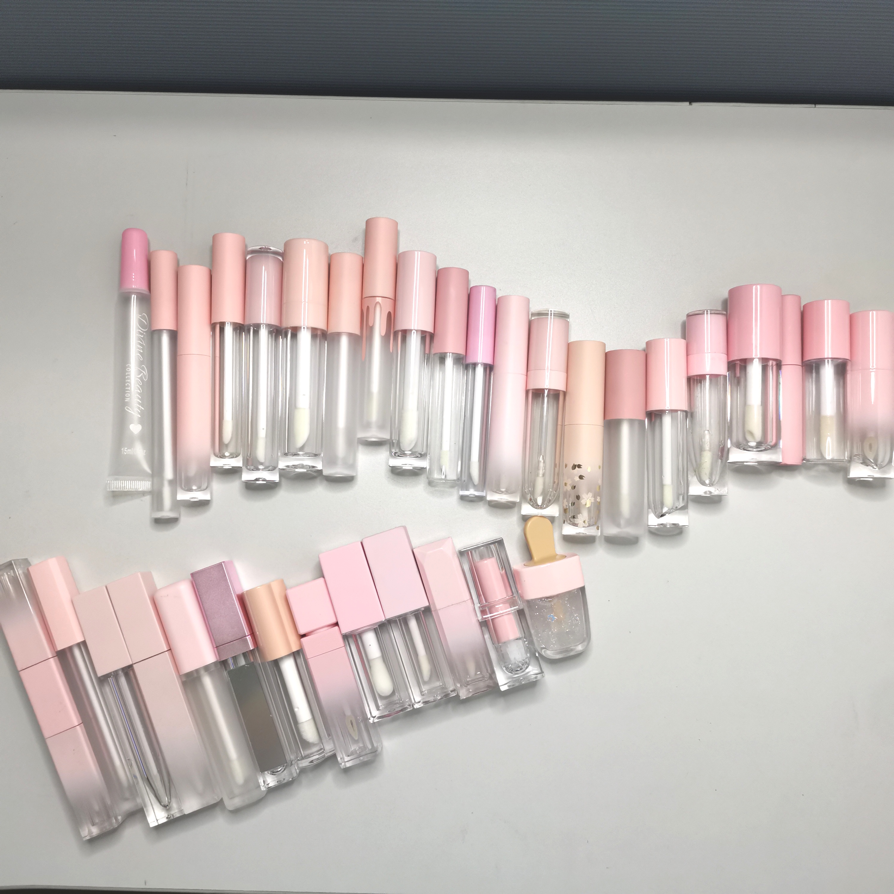 hot pink lip gloss tubes