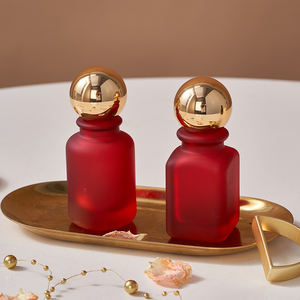 Ventas calientes Caro Vacío 50ml Copa negra redonda Botella esmerilada Perfume con tapa de bola dorada - Product Image 1