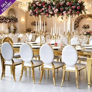 Muebles de lujo para banquetes de boda, sillas de acero inoxidable dorado con cuero blanco para la recepción de bodas. - Product Image 1
