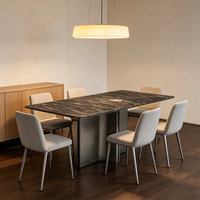 Table à manger rectangulaire de luxe moderne en marbre noir et argent naturel, base en bronze brossé, 8 places, idéale pour appartement