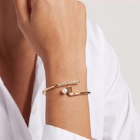 Nouvelle collection de bijoux sportifs plaqués or en laiton, style tendance : bagues sportives, bracelets ouverts et bijoux en zircon transfrontaliers
